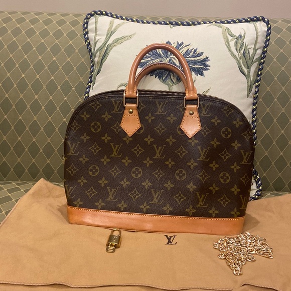 Authentic Louis Vuitton bag lock key and dust bag